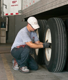 Mechanic working on tire